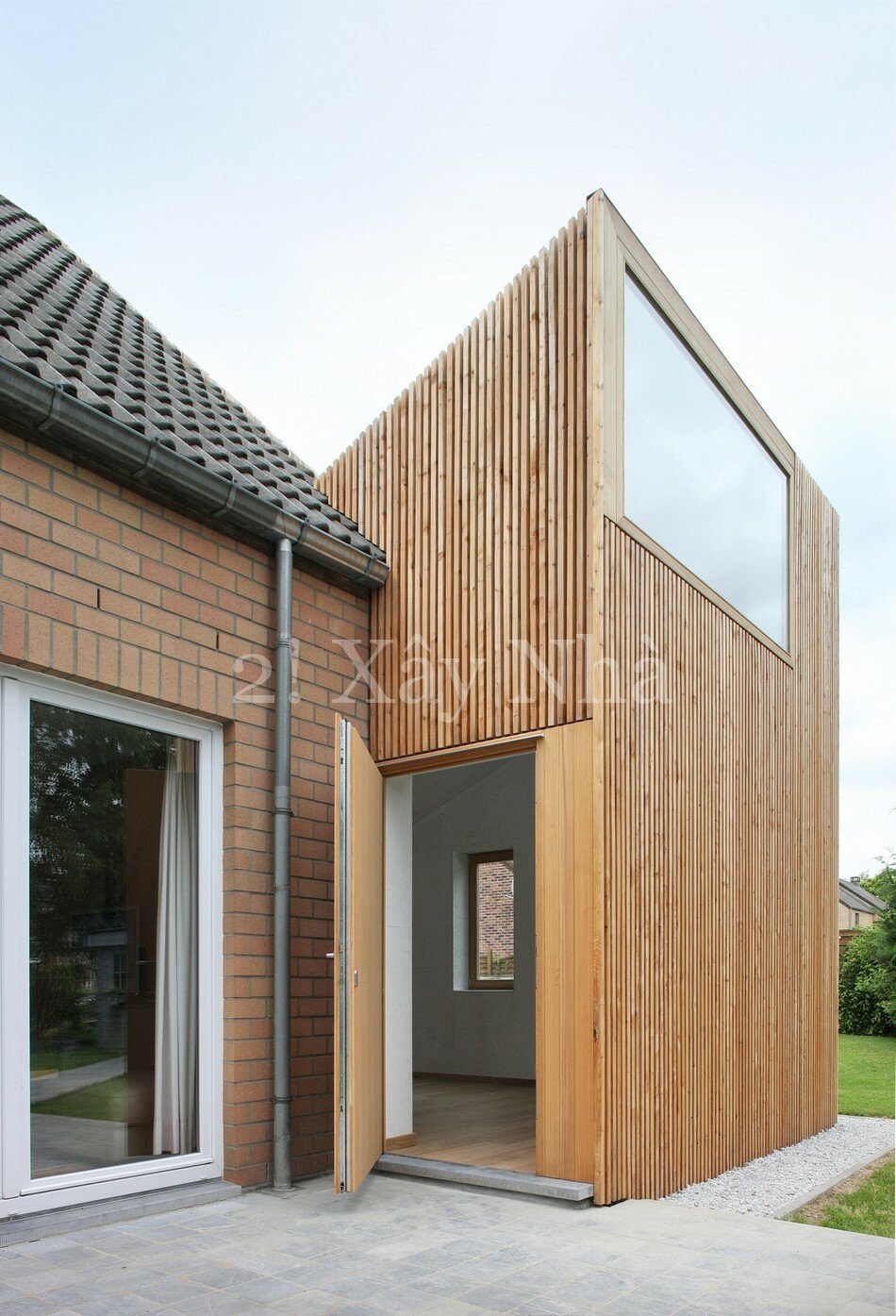 wooden house 17 Striking Home Extension Creatively Enhancing a Pavilion Type Residence in Belgium