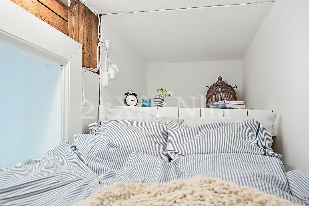 modern crib 6 Scandinavian One Room Apartment Exuding Great Taste and Peaceful Living